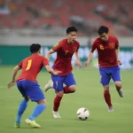 Cầu thủ Việt Nam thi đấu trong trận đấu vòng 1/8 Asian Cup 2019