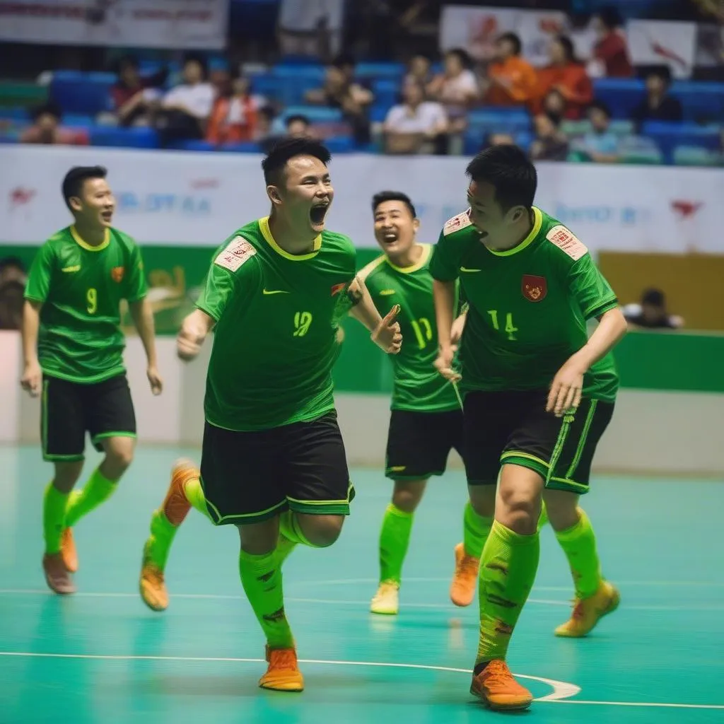 Cầu thủ Futsal Việt Nam ăn mừng bàn thắng