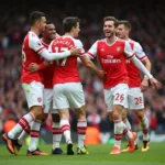 Cầu thủ Arsenal ăn mừng chiến thắng Cup FA 2015