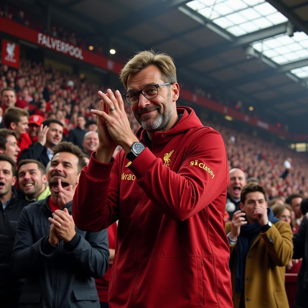 Jurgen Klopp celebrates with Liverpool fans at Anfield